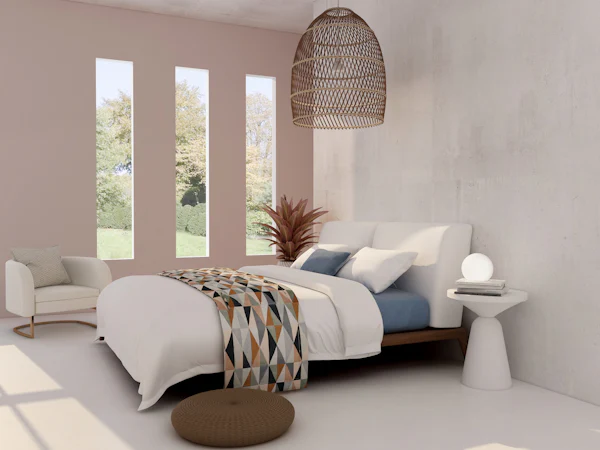 Bright bedroom with a queen bed, blue and white linens, and tall windows